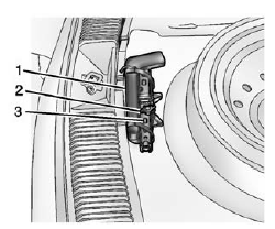 Storing a Flat or Spare Tire and Tools